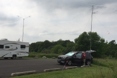 Mike WB8BZK and an unidentified person having a discussion at the VHF station