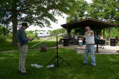Pierre K9EYE and John KE9NDY continue assembing of the cobweb antenna- - Photo by Fred Soop