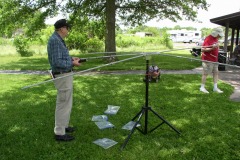Pierre K9EYE checking the cobweb antenna as Mike WB8BZK passes by - Photo by Fred Soop