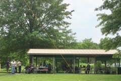 Several operators enjoying food and refreshments at the Rush Creek pavilion