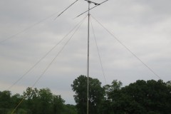 Two element triband CW antenna against a background of a cloudy sky