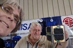 Phil W1EME and JoAnne K9JKM getting a selfie with the engineering model of the Fox-1 cubesat.