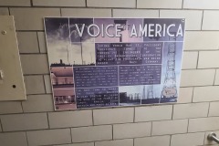 VOA poster at building entrance