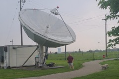 Glenn (K9OK) stands next to the WC8VOA 10 GHz EME antenna