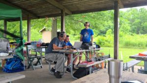 Bill, KD9WEW and visitors operating the GOTA station