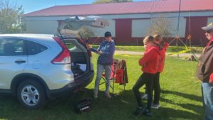 Jen (KD9FMJ) showing off her Maker and portable skills for the scouts