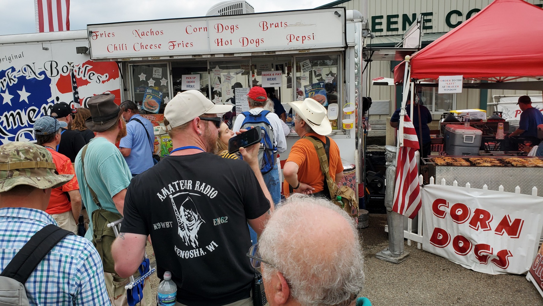 Standing in line for a pork chop sandwich.