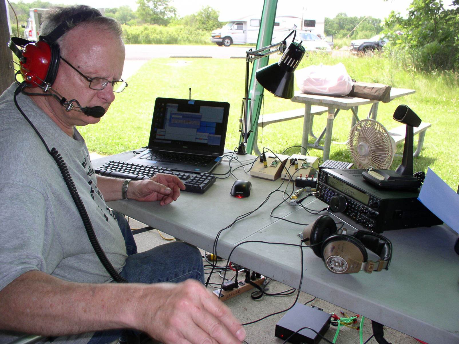 John KA9CAR checking to see that the 40m SSB station is shipshape - Photo by Fred Soop