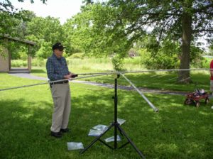 Pierre K9EYE checking out the cobweb antenna - Photo by Fred Soop