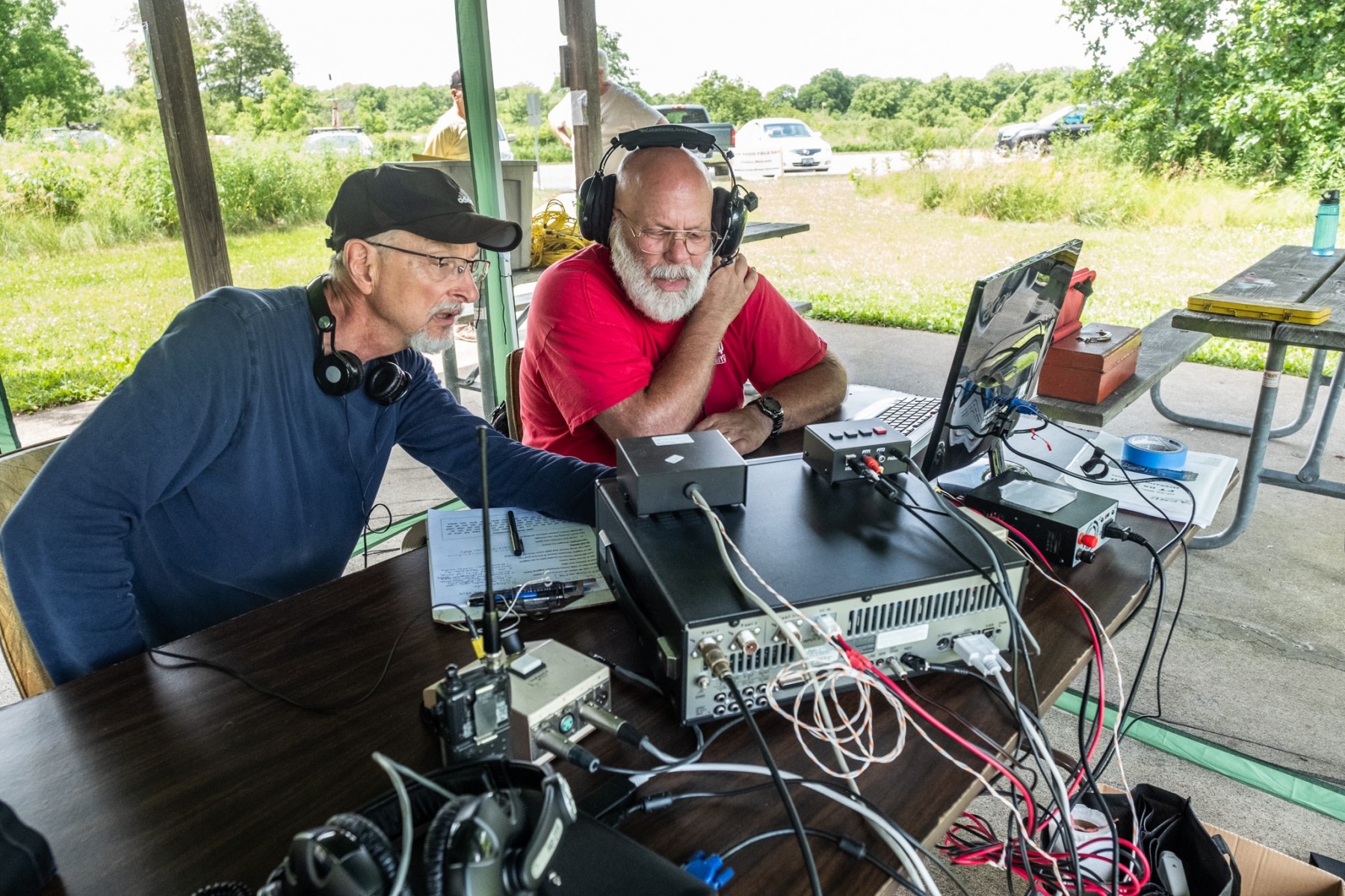 Roger KF9D and Joel W9NXM fine tuning the CW station