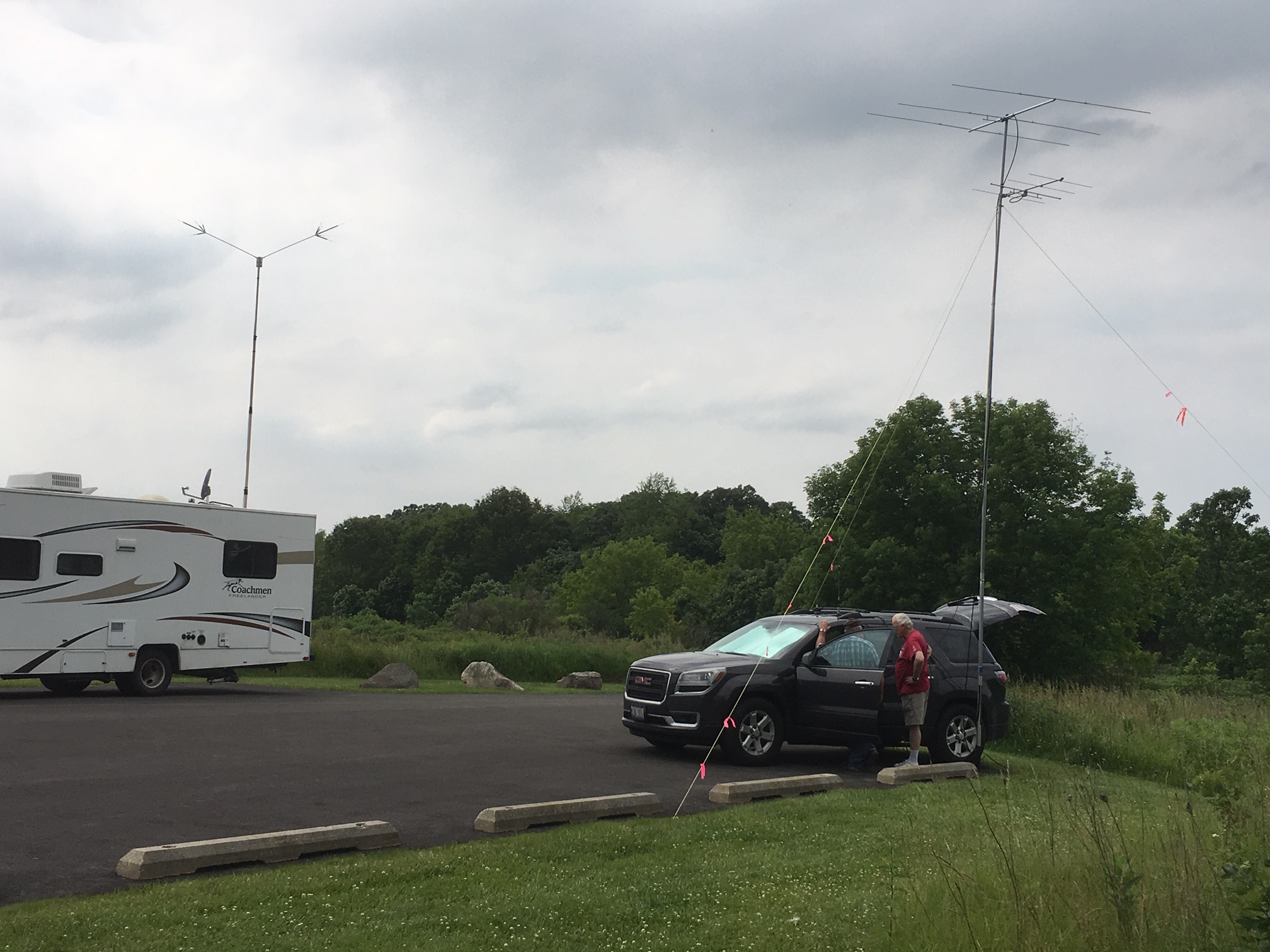 Mike-WB8BZK-and-an-unidentified-person-having-a-discussion-at-the-VHF-station